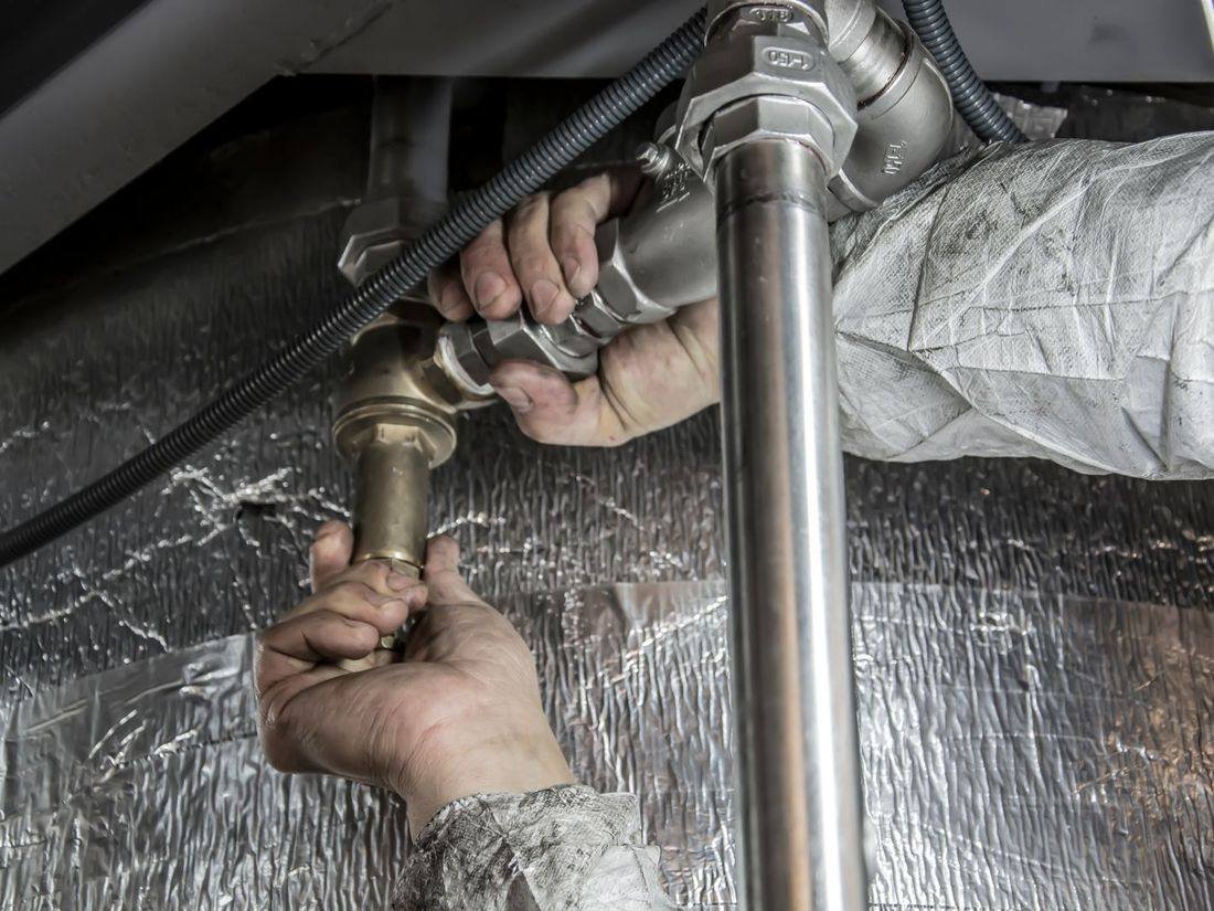 Plumber fitting pipes